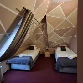 Hotel Unicornis Eger - Szobák