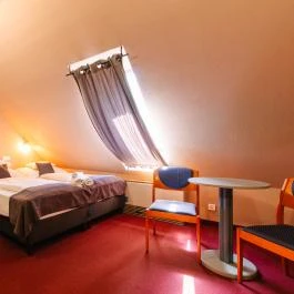 Hotel Unicornis Eger - Szobák