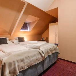 Hotel Unicornis Eger - Szobák