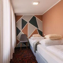 Hotel Unicornis Eger - Szobák