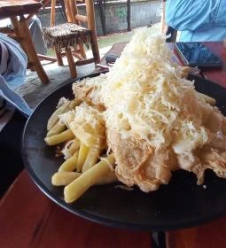 Kőkorszaki Pocak-tömő Étterem & Pizzéria