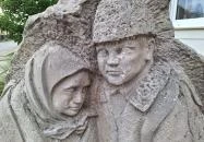 Kitelepítettek emlékműve Iklad