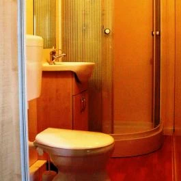 Aranykert Mobilház-Apartmanok Vének - Szobák